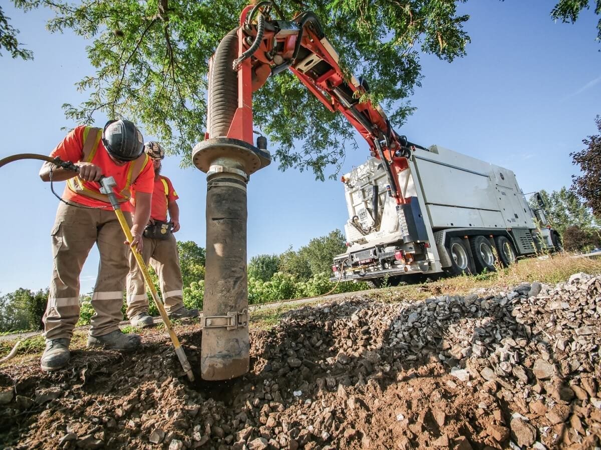 man excavating job site